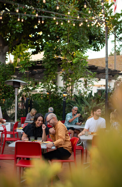 a couple enjoying dinner at one of San Luis Obispo’s many restaurants